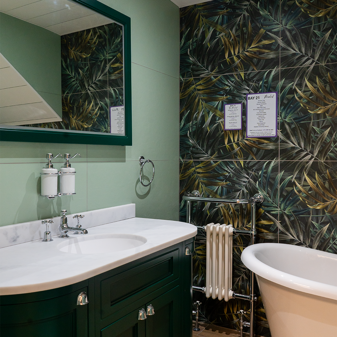 Dark green vanity with botanical tiles
