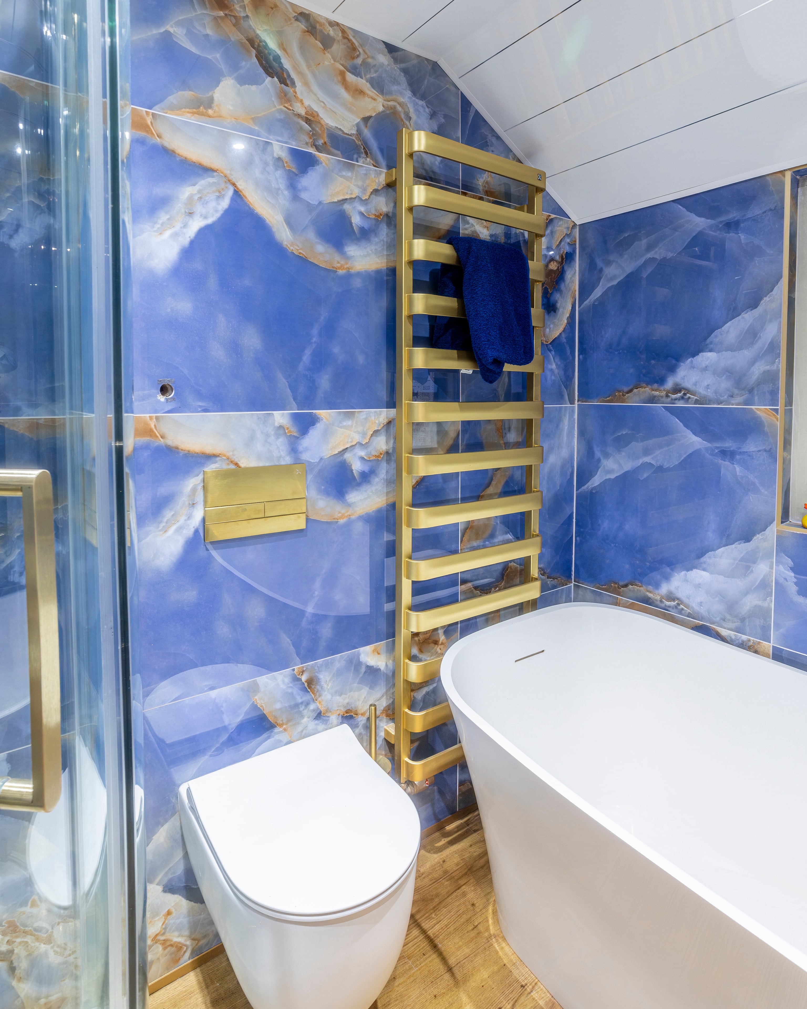 Blue onyx suite with gold rail