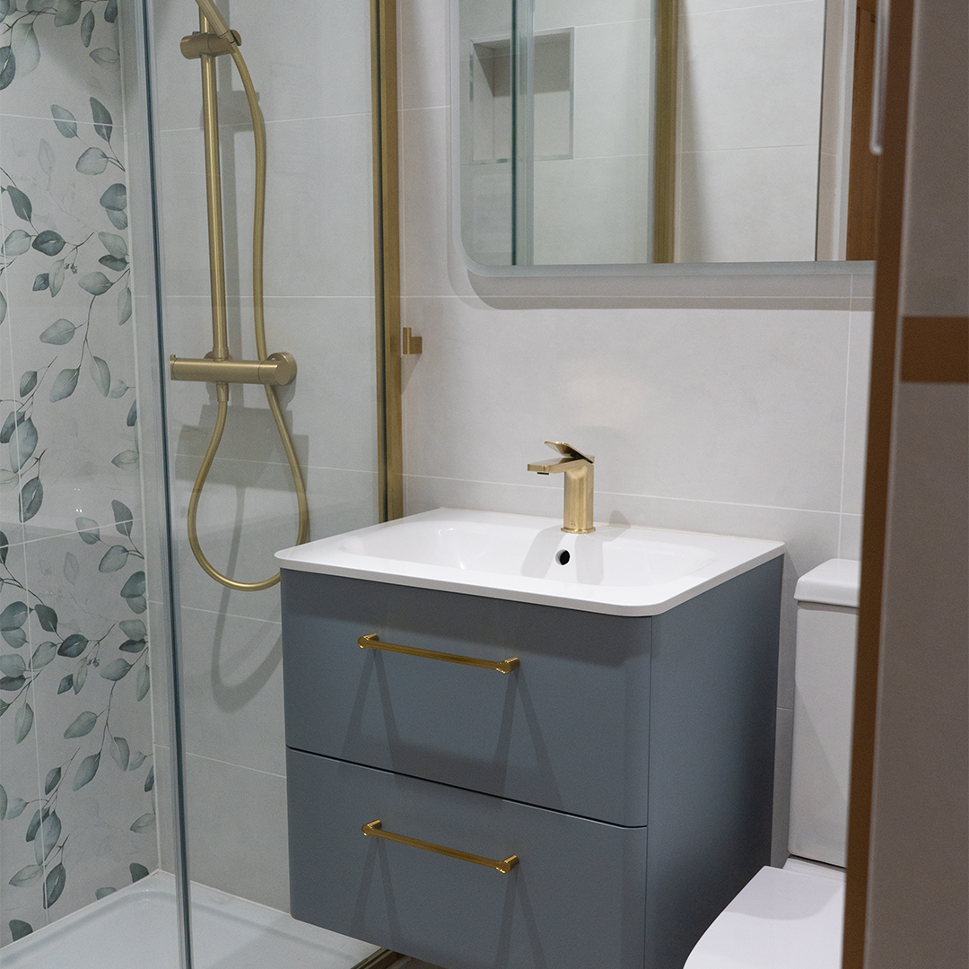Grey vanity with gold shower