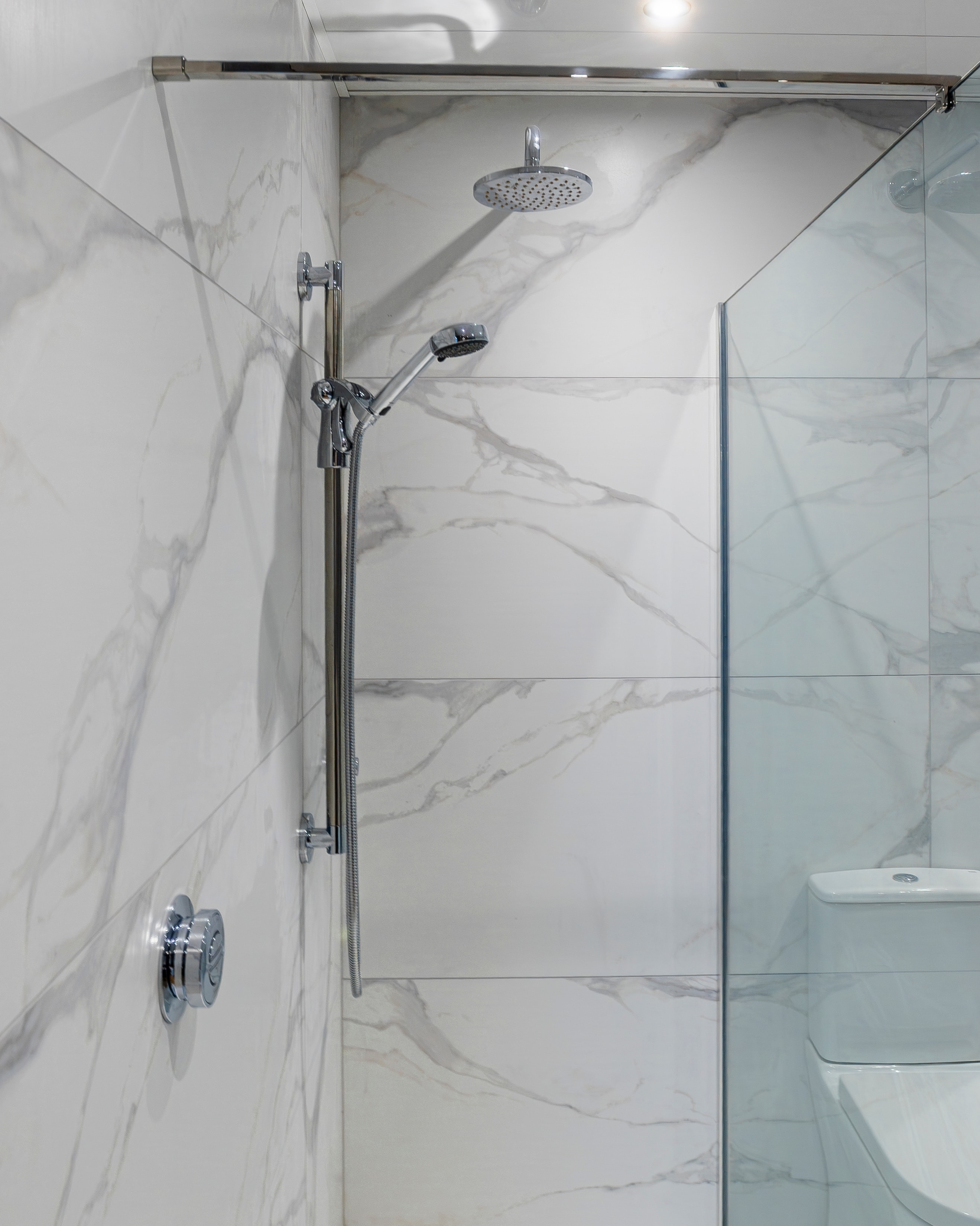 White marble chrome shower