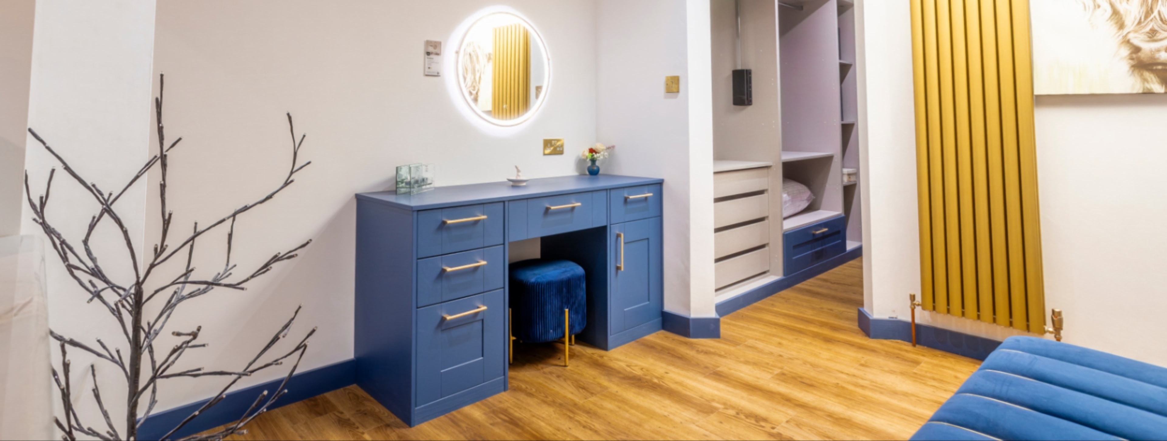 Blue bedroom with yellow accents